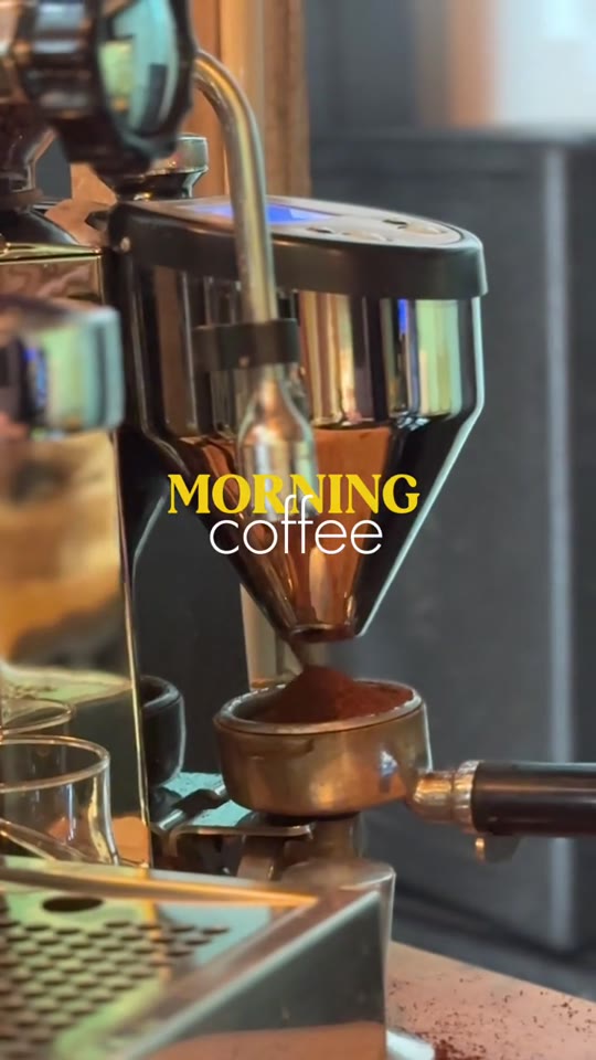 Coffee being prepared with an espresso machine